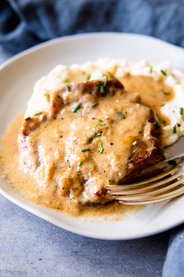 instant pot sour cream pork chops on a plate