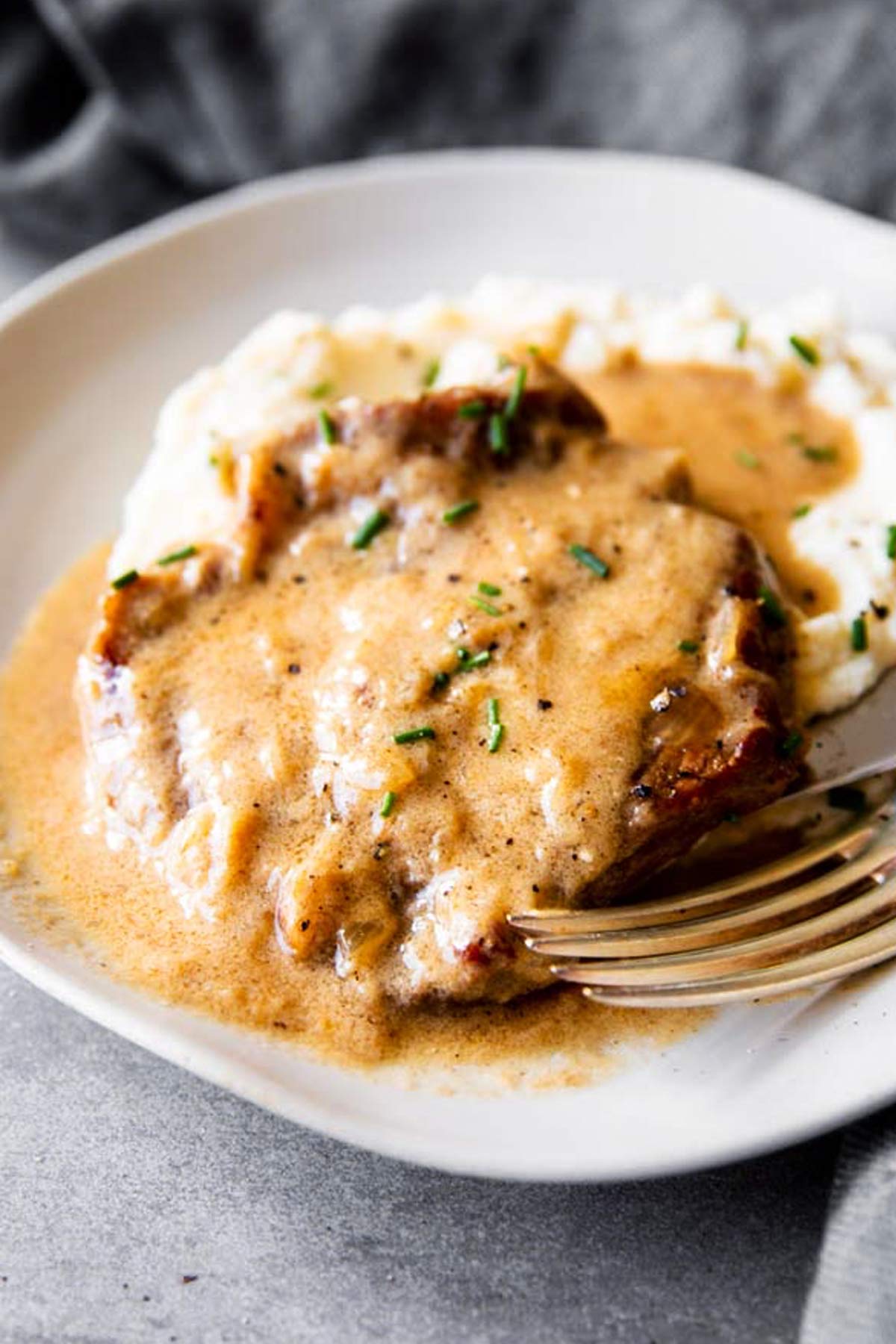 instant pot sour cream pork chops on a plate