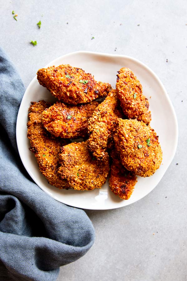 low carb oven fried chicken on a white plate