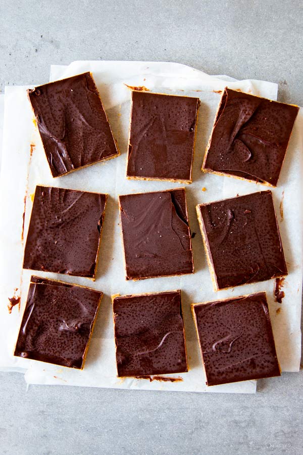cut up peanut butter bars on the counter