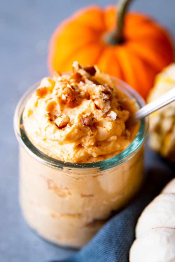 pumpkin cheesecake cottage whip in a glass with pumpkins