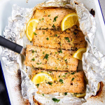 baking dish with lemon garlic butter salmon