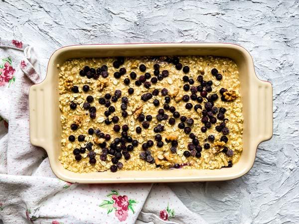 dish with unbaked blueberry oatmeal bake