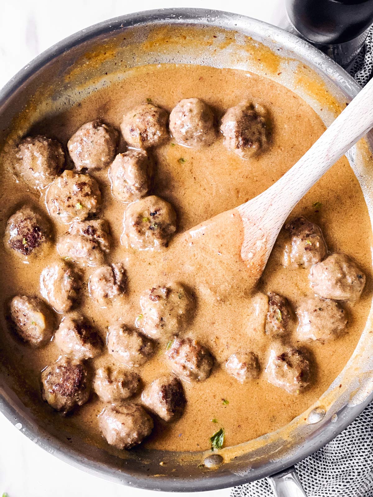 close up photo of low carb meatballs in gravy