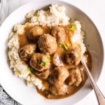 bowl with mashed cauliflower and Keto Swedish meatballs