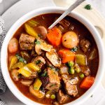 overhead view of keto beef stew in a white bowl