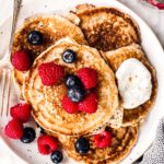 close up photo of white plate with sourdough pancakes